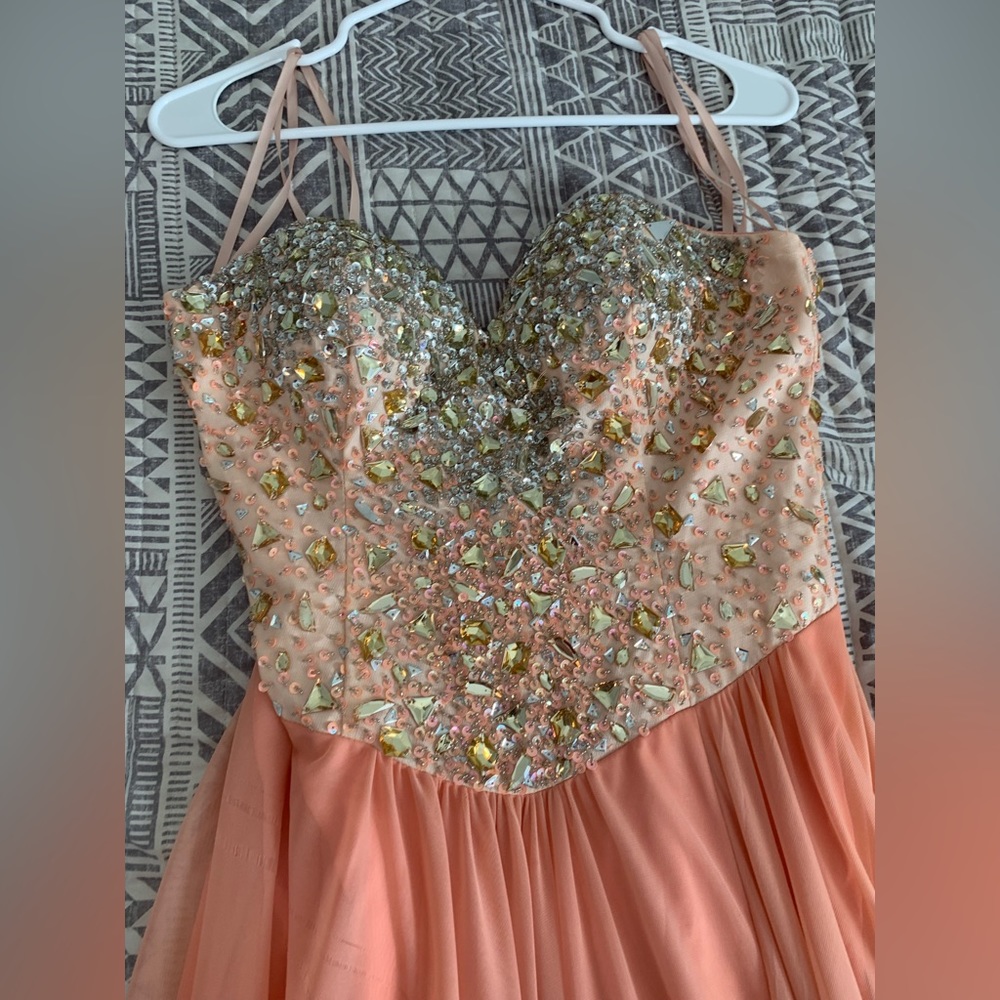 Prom dress size six, strapless, leg split, strapless.